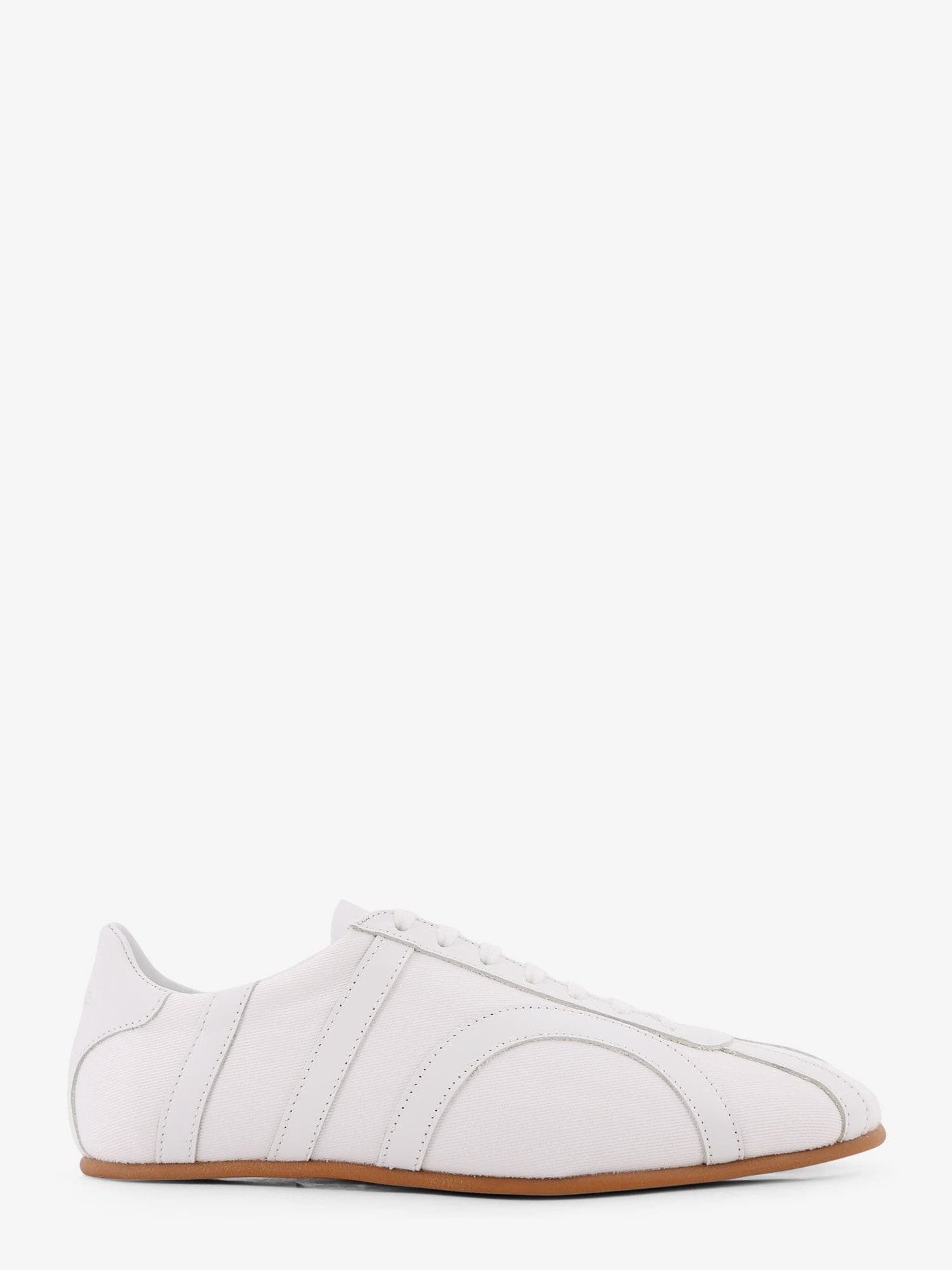 Toteme Canvas low-top sneakers with leather profiles